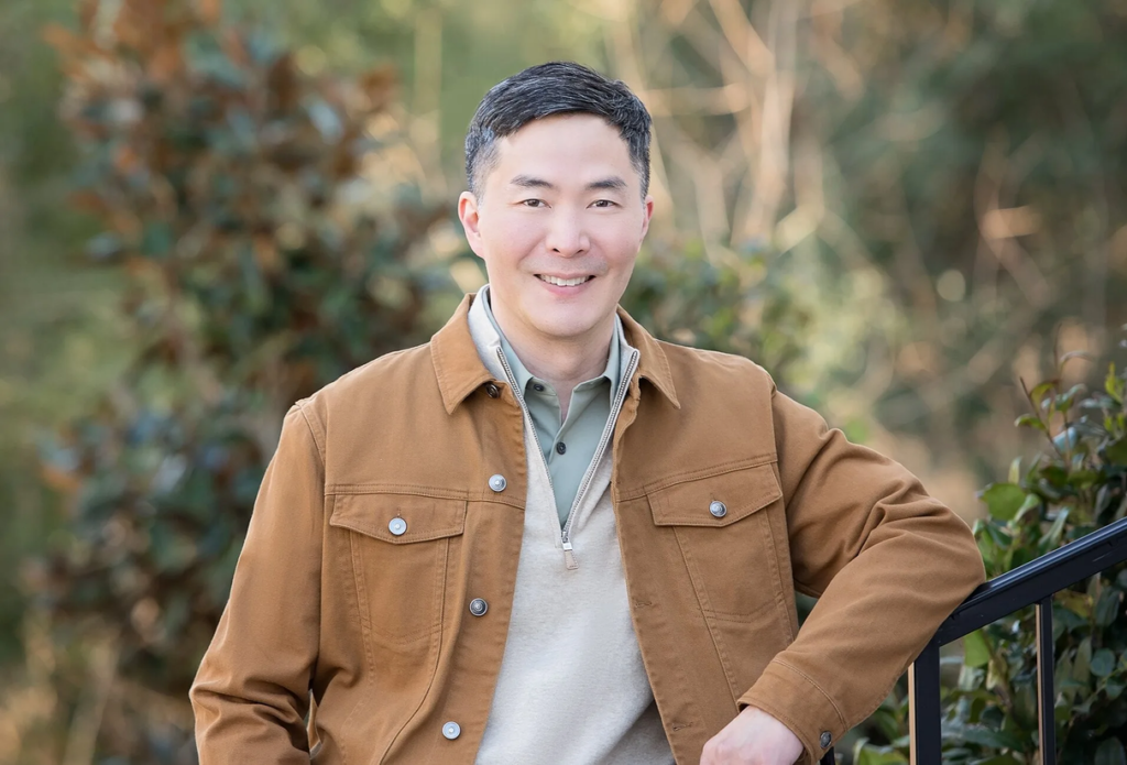Dr. Cho in brown jacket, expert plastic surgeon